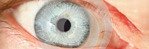 Light blue human eye colour, extreme macro shot of persons vision