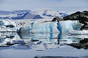 Light blue iceberg at JÃ¶kulsÃ¡rlÃ³n glacier lagoon, Iceland