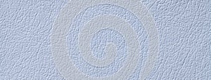 Light blue leather texture background with pattern, macro. Structure pastel sky textile backdrop