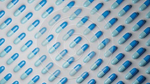 Light blue pills on white background. Pharmaceutical industry, medical treatment, presciption drugs concept. Digital 3D render.