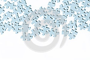 Light blue puzzle pieces separate