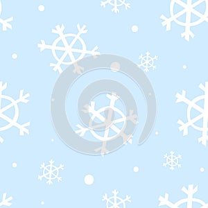 Light blue seamless pattern with white snowflakes