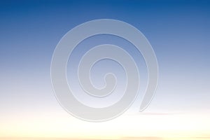 Light blue sky with clouds, may be used as background