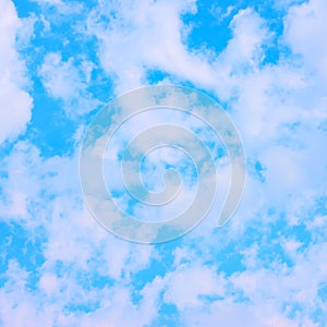 Light blue spring sky with clouds