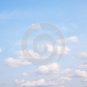 Light blue spring sky with clouds photo