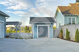 Light blue storage shed outside a house at Daybreak, Utah