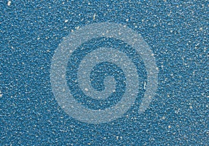 Light blue wall or surface with fine grained texture
