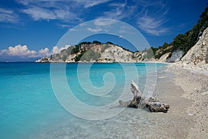 Light blue water on beach on Gidaki on the Ithaca Ithaki or Ithaka island like paradise with blue sky in Greece