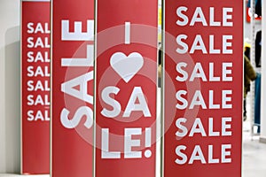 Light boards with sale signs in a store