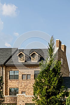 Light Brick Condos with Dormers