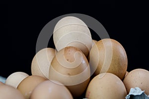 Light brown eggs place in pyramid shape
