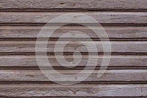 Light brown and grey wood texture background. Gray painted wooden planks with nails. Shabby light brown wooden fence boards. Vinta