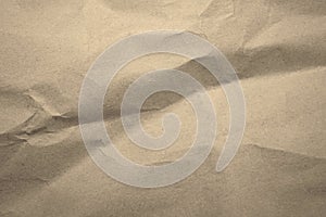 Light brown rough crumpled paper texture background with copy space