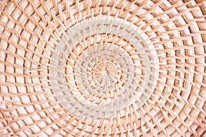 Light brown wood crafts rattan weave in circle many layer patterns , natural texture abstract for background