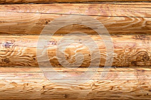 A light brown wooden wall of a house