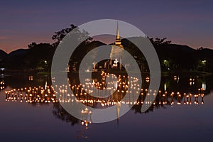 light in Buddha Statue in Loy Kratong Festival, Sukhothai Historical park , Thailand