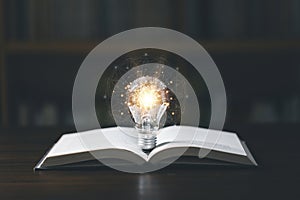 Light bulb with book, Idea concept for innovation idea, power of knowledge, power of reading, Self-learning, education knowledge.