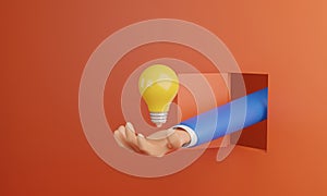 Light bulb on a businessman`s hand sticking out of a door on an orange background