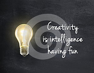 Light bulb with creativity quote photo