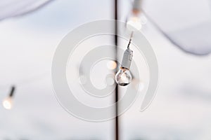 Light bulb decor in an outdoor party