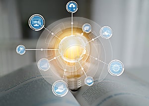 Light Bulb with Digital Icons Representing Innovation, Technology Advancement, Data Analysis, and Business Growth in a