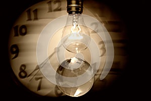 Light bulb, earth and clock