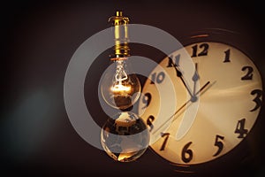 Light bulb, earth and clock
