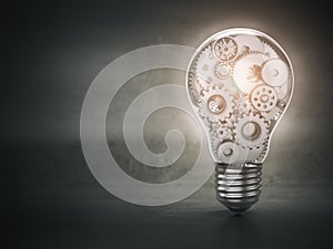 Light bulb and gears. Perpetuum mobile. Innovation, creativity