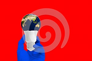 Light bulb of globe shape devastate and energy concept.