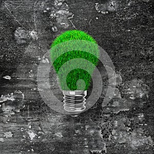 Light bulb with green grass for ECO concept