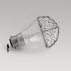 Light bulb with hand drawn brain