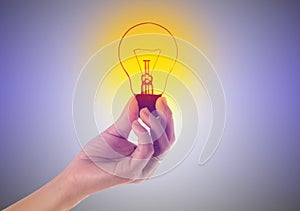 The light bulb in hand  idea  innovation inspira