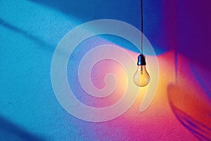 A light bulb hanging from a ceiling