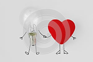 Light bulb and heart holding hands - Concept of brain and heart