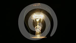 A light bulb illuminates a dark room, much like an idea in our mind