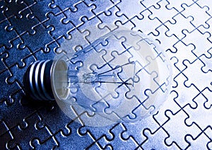 Light bulb on jigsaws