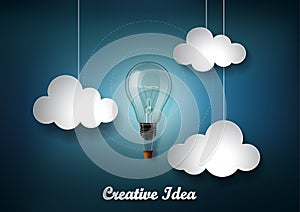 Light bulb is among a lot of cloud on dark blue background with Origami paper cut style, Representation of creative business idea photo