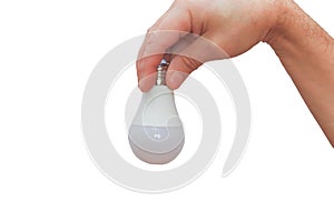 A light bulb in the man`s hand is a close-up. Isolate on a white background