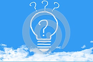 Light bulb with question cloud shaped on blue sky