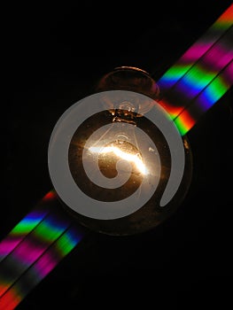 Light bulb and rainbow