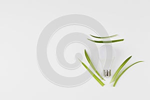 Light bulb with recycling symbol on white background . Concept of ecology and green energy