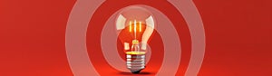 light bulb on red background