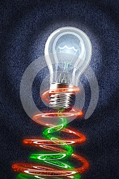 Light Bulb shining on jeans. Creativity concept. E