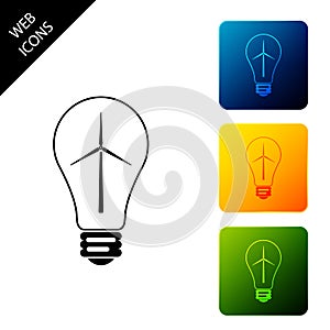 Light bulb with wind turbine as idea of eco friendly source of energy icon isolated on white background. Alternative