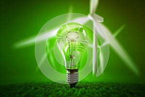 Light bulb with windmill turbine inside as a symbol of renewable green energy, 3D illustration, eath day
