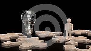 The Light bulb and wood human figure on jigsaw 3d rendering