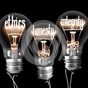 Light Bulbs with Ethics, Honesty and Integrity Concept photo