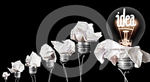 Light Bulbs with Crumbled Paper Idea Concept