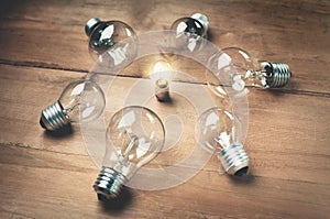 Light bulbs. Leader concept