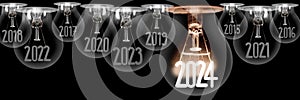 Light Bulbs with New Year 2024.